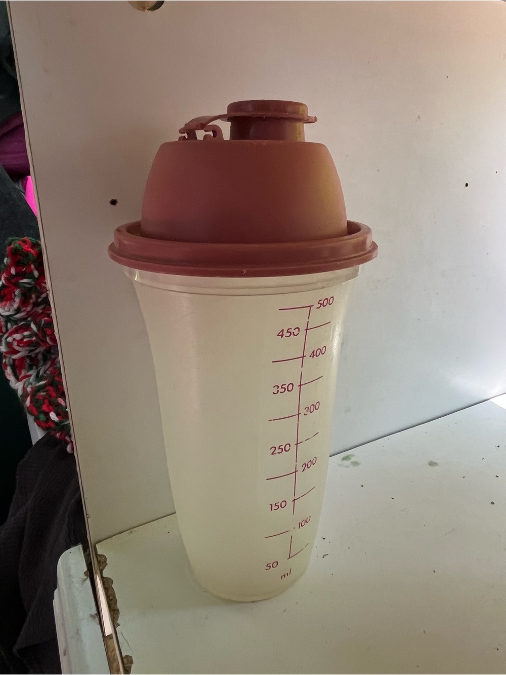 Tupperware Red Lidded Shaker Bottle with Measurement Markings